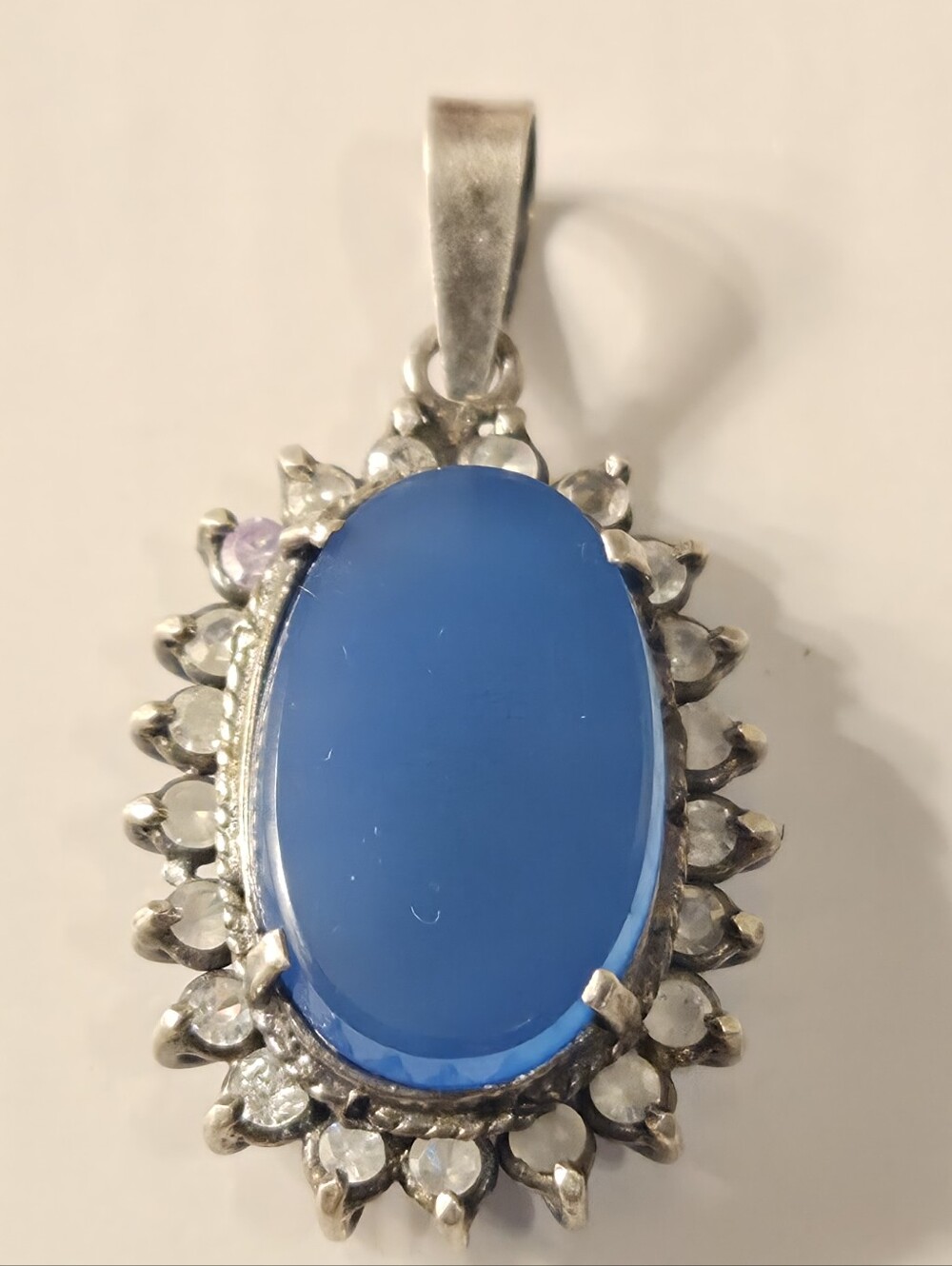 Sterling Silver Pendant Wity Blue Calcedony And Clear Zircon